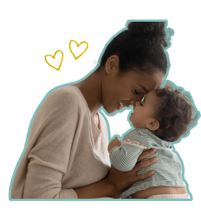 A woman and infant smiling with their heads against each other and noses touching